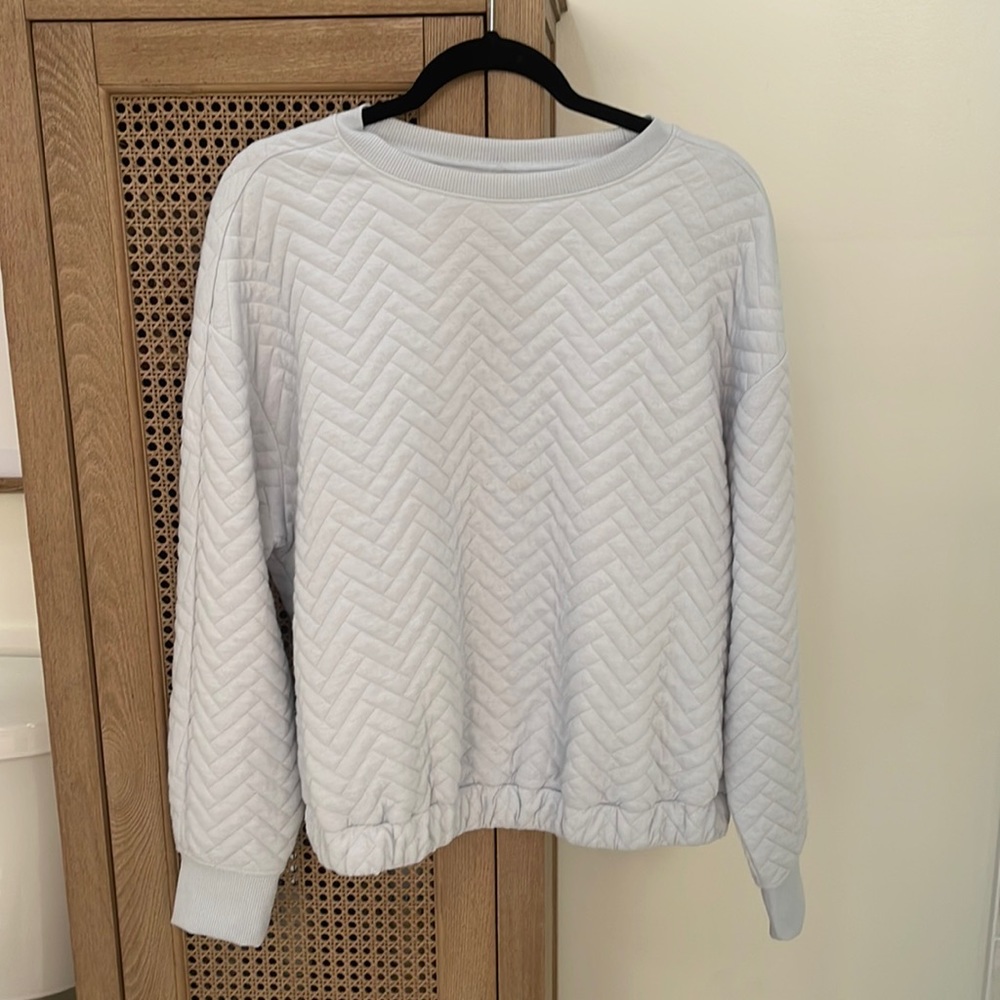 A new day quilted sweatshirt. Light blue size L